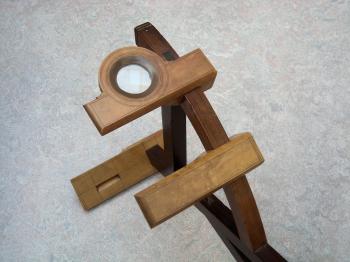 Three of the four restored vanes of an original Davis quadrant.