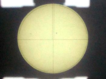 The projected image of the sun and circular reticle of the ABLE-T2.