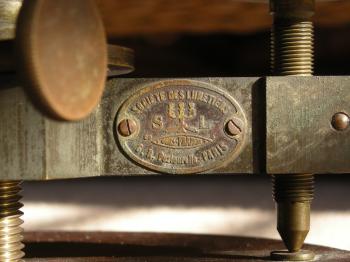 The Société des Lunetiers label with number 69 and 4 on the instrument.