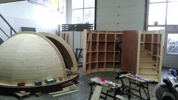 The dome, quarter cylindrical wall and spiral staircase of the observatory nearing their completion.