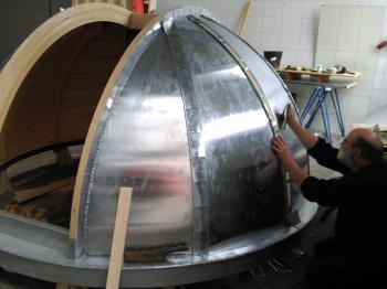 Zinc-worker Karel finalizing the zinc cladding.