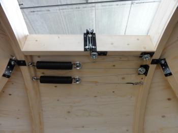 The supporting springs and wire for closing the main shutter.