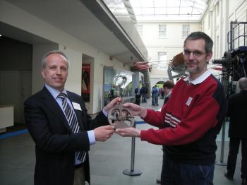 Günther Oestmann (right) handing over the astrolabe copy to me at the NMM in Greenwich.